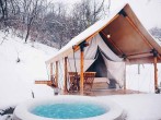 Tent and hot tub in snow Tent and hot tub in snow